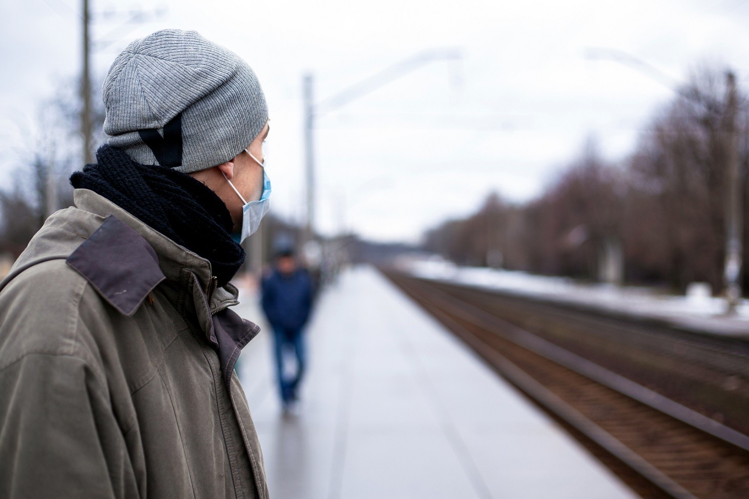 The Guy In The Respirator Is Waiting For The Train. Concept: Col