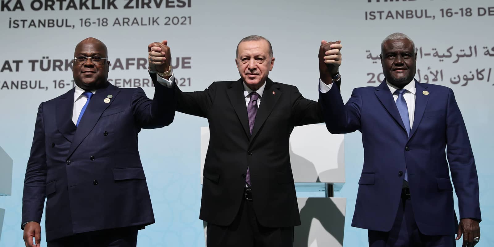 Turkish President Recep Tayyip Erdogan (C) poses for photos at a press conference after the Third Turkey-Africa Partnership Summit in Istanbul, Turkey, on Dec. 18, 2021.