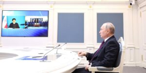 Russia's President Vladimir Putin in his office at the Moscow Kremlin during a video conference meeting with Iran s President Ebrahim