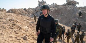 Israeli Defense Minister Yoav Gallant (Front) is seen during a tour of the Philadelphi Corridor, an area that runs along the Gaza-Egypt border, on Aug. 21, 2024.