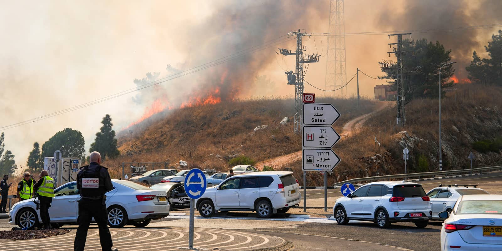 Fire and smoke are seen following rocket attacks from Lebanon, in Rosh Pina, northern Israel, on Oct. 20, 2024