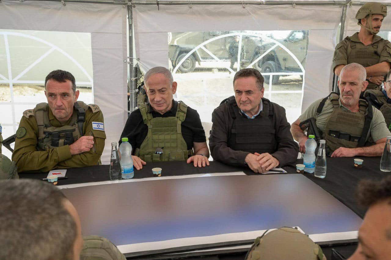 November 19, 2024, Netzarim Corridor, Gaza Strip: Israeli Prime Minister BENJAMIN NETANYAHU (2nd L) visits the Netzarim Corridor in the Gaza Strip with Defense Minister ISRAEL KATZ (2nd R), IDF Chief of Staff Lt. Gen. HERZI HALEVI (L) and ISA Director RONEN BAR (R).